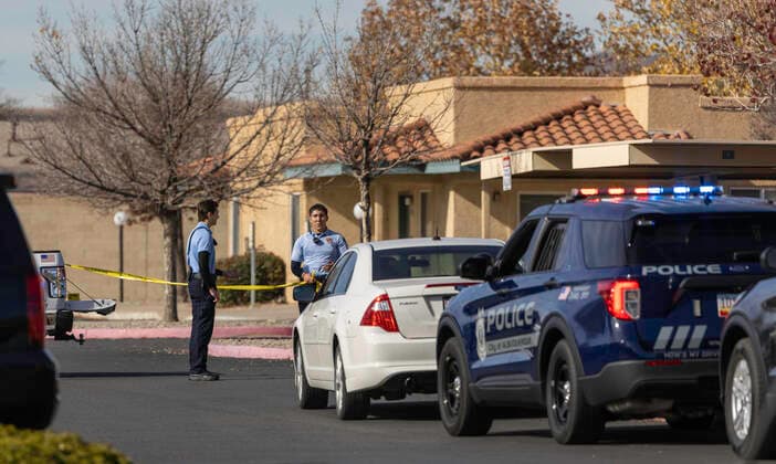 December 2, 2021, Albuquerque, New Mexico, USA: Albuquerque..APD Police Service Aides stand outside the Villa Hermosa apartment complex, as officers investigate an Officer Involved Shooting on December 02, 2021. for the Albuquerque Journal.Albuquerque, New Mexico Albuquerque USA - ZUMAab1_ 20211202_zaf_ab1_018 Copyright: xMikexSandovalx