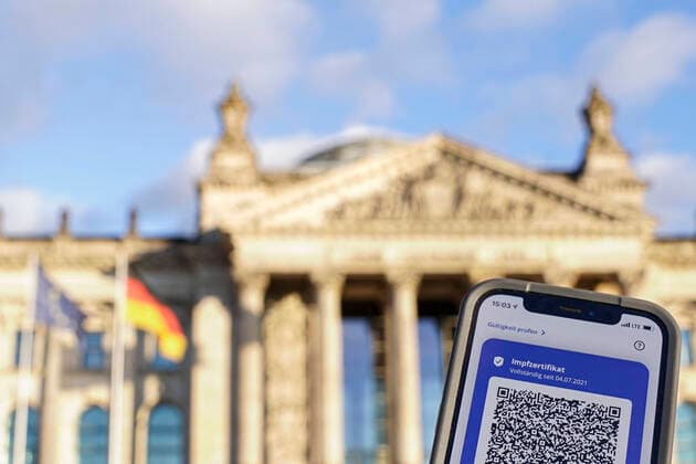 Symbol photo Bundestag advises on vaccination obligation Symbol photo Digital vaccination passport and German Bundestag Current deliberations of the Federal Government and debate in the German Bundestag about a possible Corona vaccination obligation in Germany Berlin Berlin Germany