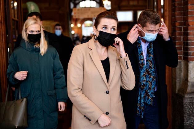 Prime Minister Mette Frederiksen S and Director of the National Board of Health Soeren Brostroem speak to the press after visiting the covid 19 vaccination site in the old ticket office at Copenhagen Central Station, Friday 3 December 2021 The Prime Minister and Soeren Brostroem wi  Copyright: PhilipxDavali PhilipxDavalix cop105 spdk20211203-160858-L