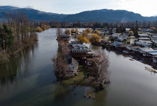 December 5, 2021, MISSION, BC, CANADA: Properties are surrounded by high water after floodwaters began to recede at Everglades Resort on Hatzic Lake near Mission, B.C., on Sunday, December 5, 2021. MISSION CANADA  - ZUMAc35_ 20211205_zaf_c35_102 Copyright: xDarrylxDyckx