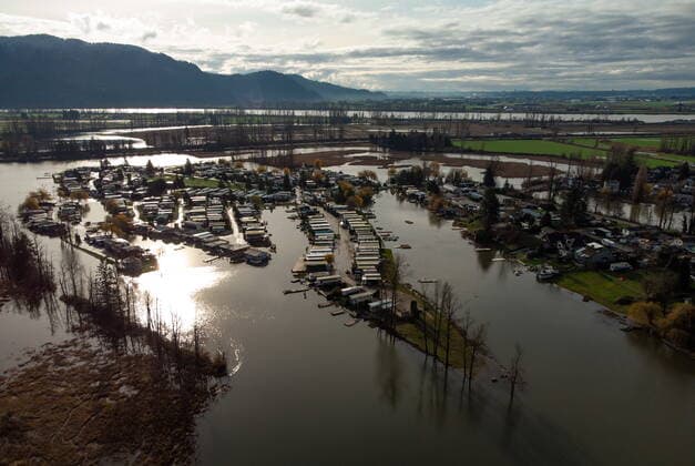 December 5, 2021, MISSION, BC, CANADA: Properties on Hatzic Lake are surrounded by high water after floodwaters began to recede, near Mission, B.C., on Sunday, December 5, 2021. MISSION CANADA  - ZUMAc35_ 20211205_zaf_c35_106 Copyright: xDarrylxDyckx