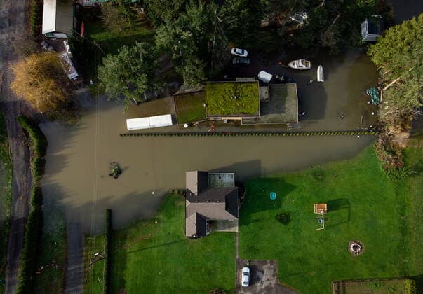 December 5, 2021, MISSION, BC, CANADA: Floodwaters are seen outside houses on farmland near Hatzic Lake east of Mission, B.C., on Sunday, December 5, 2021. MISSION CANADA  - ZUMAc35_ 20211205_zaf_c35_111 Copyright: xDarrylxDyckx