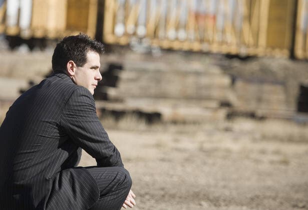 Man In A Pinstriped Suit Bending Down Copyright: KellyxRedinger 1789702