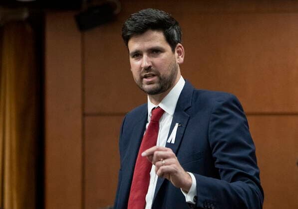 December 6, 2021, Ottawa, ON, Canada: Immigration, Refugees and Citizenship Minister Sean Fraser rises during Question Period, Monday, December 6, 2021 in Ottawa. Ottawa Canada  - ZUMAc35_ 20211206_zaf_c35_038 Copyright: xAdrianxWyldx