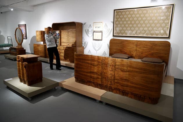 MOSCOW, RUSSIA â€“ DECEMBER 6, 2021: A woman visits an exhibition titled The History of Russian Design â€“ The Best of 1917-2022 and held at the New Tretyakov Gallery, the first to feature a vast collection of the Moscow Design Museum. Artyom Geodakyan TASS  TS11AE24