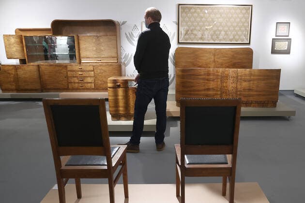 MOSCOW, RUSSIA â€“ DECEMBER 6, 2021: A man visits an exhibition titled The History of Russian Design â€“ The Best of 1917-2022 and held at the New Tretyakov Gallery, the first to feature a vast collection of the Moscow Design Museum. Artyom Geodakyan TASS  TS11AE2E
