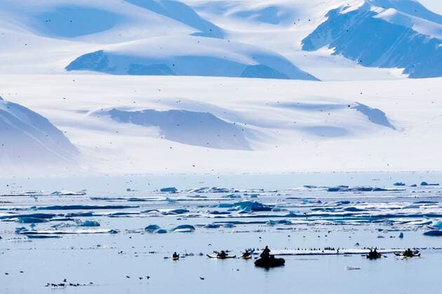 Kayakers By Ice Berg Off Coast Of Nunavut, Canada Copyright: RichardxWear 1828507
