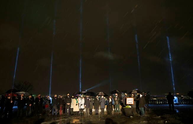 December 6, 2021, Montreal, PQ, Canada: Prime Minister Justin Trudeau, Quebec Premier Francois Legault, and Montreal mayor Valerie Plant stand with family members and dignitaries during a vigil in memory of the 14 victims of the 1989 Ecole Polytechnique Montreal tragedy in Montreal on Monday, December 6, 2021. Montreal Canada  - ZUMAc35_ 20211206_zaf_c35_055 Copyright: xPaulxChiassonx