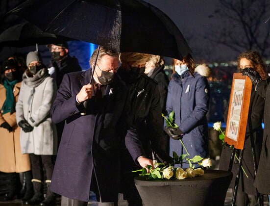 December 6, 2021, Montreal, PQ, Canada: Quebec Premier Francois Legault and his wife Isabelle Brais place a white rose for two of the victims during vigil in memory of the 14 victims of the 1989 Ecole Polytechnique Montreal tragedy, in Montreal, Monday, Dec. 6, 2021. Montreal Canada  - ZUMAc35_ 20211206_zaf_c35_059 Copyright: xPaulxChiassonx