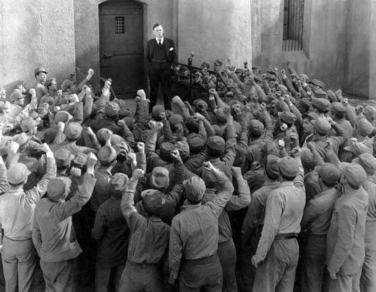Walter Huston (center in Suit), on-set of the Film, The Criminal Code directed by Howard Hawks, 1931  Copyright: xJTxVintagex xGlasshousexImagesx jtv002999