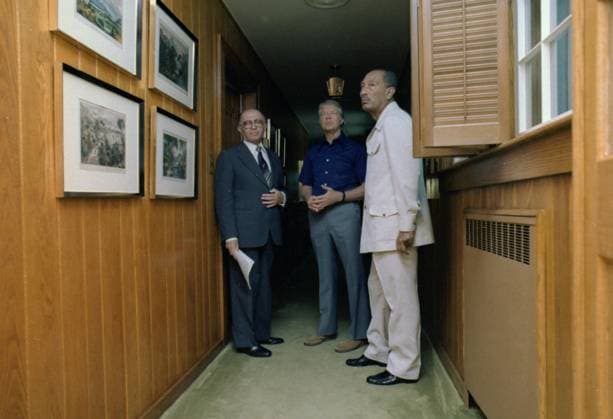 Menachem Begin, Jimmy Carter and Anwar Sadat meet during the Camp David Summit. ca. 09 07 1978 1062_05_L_-11040-