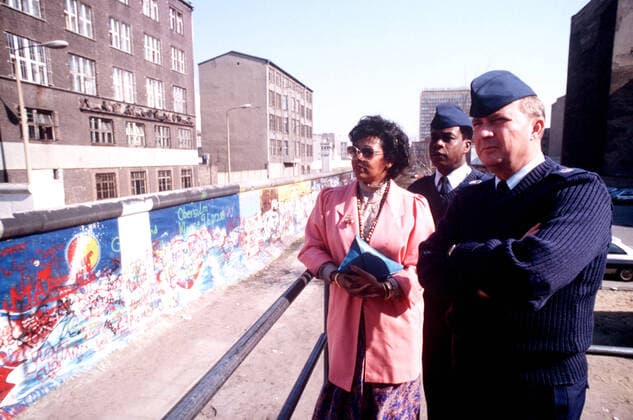 CMSGT of the Air Force James C. Binnicker, CMSGT Willie Currie, 7350th Air Base Group (7350th ABG), and Mrs. Currie visit the Berlin Wall. Binnicker is in Berlin to tour Tempelhof Central Airport, home base of the 7350th ABG. 1062_05_L_-9297-