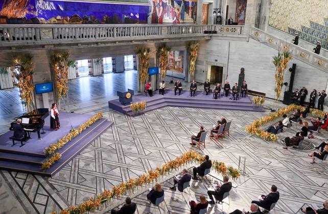 OSLO, NORWAY â€“ DECEMBER 10, 2021: The 2021 Nobel Peace Prize award ceremony at Oslo City Hall. The Norwegian Nobel Committee has decided to award the Nobel Peace Prize for 2021 to Philipino-American journalist Maria Ressa and Russian journalist Dmitry Muratov in recognition of their efforts to safeguard freedom of expression, which is a precondition for democracy and lasting peace . Sergei Bobylev TASS  TS11B5A5