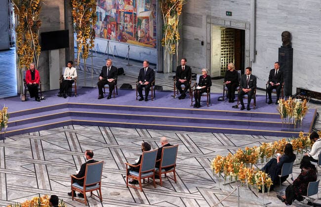OSLO, NORWAY â€“ DECEMBER 10, 2021: Norwegian Nobel Committee Chairwoman Berit Reiss-Andersen, Filipino-American journalist co-founder and CEO of Rappler Maria Ressa and Russian journalist, Novaya Gazeta editor-in-chief Dmitry Muratov (from L back) attend the 2021 Nobel Peace Prize award ceremony at Oslo City Hall. The Norwegian Nobel Committee has decided to award the Nobel Peace Prize for 2021 to Maria Ressa and Dmitry Muratov in recognition of their efforts to safeguard freedom of expression, which is a precondition for democracy and lasting peace . Sergei Bobylev TASS  TS11B5A9
