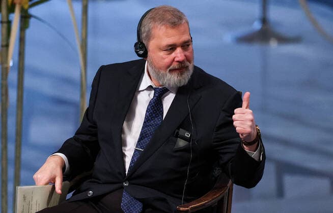 OSLO, NORWAY â€“ DECEMBER 10, 2021: Russian journalist, Novaya Gazeta editor-in-chief Dmitry Muratov gives a thumbs up sign during the 2021 Nobel Peace Prize award ceremony at Oslo City Hall. The Norwegian Nobel Committee has decided to award the Nobel Peace Prize for 2021 to Philipino-American journalist Maria Ressa and Russian journalist Dmitry Muratov in recognition of their efforts to safeguard freedom of expression, which is a precondition for democracy and lasting peace . Sergei Bobylev TASS  TS11B5BB