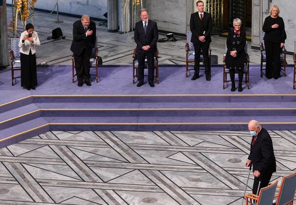 OSLO, NORWAY â€“ DECEMBER 10, 2021: King Harald V of Norway (R front) and Filipino-American journalist co-founder and CEO of Rappler Maria Ressa (L back), Russian journalist, Novaya Gazeta editor-in-chief Dmitry Muratov (2nd L back) and World Food Programme Executive Director David Beasley (3rd L back) are seen during the 2021 Nobel Peace Prize award ceremony at Oslo City Hall. The Norwegian Nobel Committee has decided to award the Nobel Peace Prize for 2021 to Philipino-American journalist Maria Ressa and Russian journalist Dmitry Muratov in recognition of their efforts to safeguard freedom of expression, which is a precondition for democracy and lasting peace . Sergei Bobylev TASS  TS11B5BE