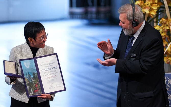OSLO, NORWAY â€“ DECEMBER 10, 2021: Filipino-American journalist, co-founder and CEO of Rappler Maria Ressa (L) and Russian journalist, Novaya Gazeta editor-in-chief Dmitry Muratov are awarded the 2021 Nobel Peace Prize in recognition of their efforts to safeguard freedom of expression, which is a precondition for democracy and lasting peace , at a ceremony at Oslo City Hall. Sergei Bobylev TASS  TS11B5DE