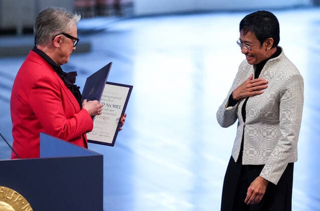 OSLO, NORWAY â€“ DECEMBER 10, 2021: Norwegian Nobel Committee Chairwoman Berit Reiss-Andersen (L) presents the 2021 Nobel Peace Prize to Filipino-American journalist, co-founder and CEO of Rappler Maria Ressa in recognition of her efforts to safeguard freedom of expression, which is a precondition for democracy and lasting peace , at a ceremony at Oslo City Hall. Sergei Bobylev TASS  TS11B5FB