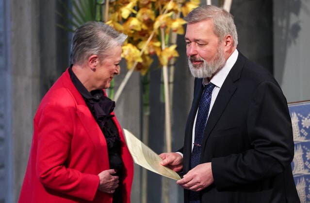 OSLO, NORWAY â€“ DECEMBER 10, 2021: Norwegian Nobel Committee Chairwoman Berit Reiss-Andersen (L) and 2021 Nobel Peace Prize winner, Russian journalist, Novaya Gazeta editor-in-chief Dmitry Muratov (R) at the 2021 Nobel Peace Prize award ceremony at Oslo City Hall. The Norwegian Nobel Committee has decided to award the Nobel Peace Prize for 2021 to Maria Ressa and Dmitry Muratov in recognition of their efforts to safeguard freedom of expression, which is a precondition for democracy and lasting peace . Sergei Bobylev TASS  TS11B618
