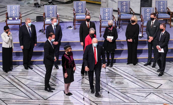 OSLO, NORWAY â€“ DECEMBER 10, 2021: King Harald V of Norway and Queen Sonja of Norway (front), Nobel Peace Prize winners, Filipino-American journalist, co-founder and CEO of Rappler Maria Ressa and Russian journalist, Novaya Gazeta editor-in-chief Dmitry Muratov (L-R back) attend the 2021 Nobel Peace Prize award ceremony at the Oslo City Hall. The Norwegian Nobel Committee has decided to award the Nobel Peace Prize for 2021 to Maria Ressa and Dmitry Muratov in recognition of their efforts to safeguard freedom of expression, which is a precondition for democracy and lasting peace . The World Food Programme was awarded the Nobel Peace Prize for 2020. Sergei Bobylev TASS  TS11B61D