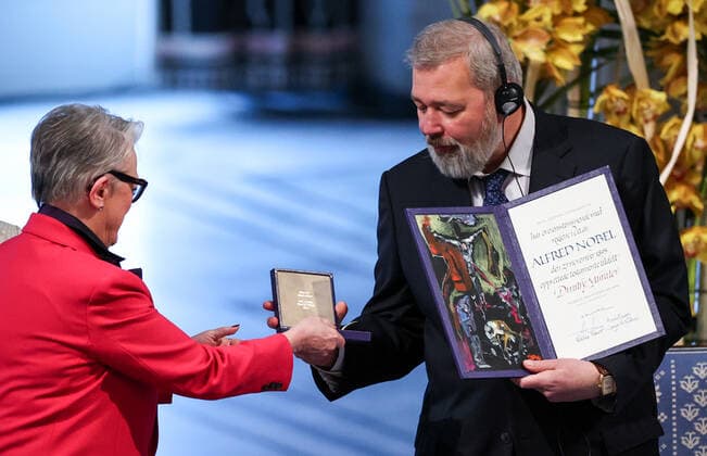 OSLO, NORWAY â€“ DECEMBER 10, 2021: Norwegian Nobel Committee Chair Berit Reiss-Andersen (L) presents Dmitry Muratov, 2021 Nobel Peace Prize winner, Russian journalist, Novaya Gazeta editor-in-chief, with diploma and gold medal at the 2021 Nobel Peace Prize award ceremony at the Oslo City Hall. The Norwegian Nobel Committee has decided to award the Nobel Peace Prize for 2021 to Maria Ressa and Dmitry Muratov in recognition of their efforts to safeguard freedom of expression, which is a precondition for democracy and lasting peace . Sergei Bobylev TASS  TS11B628