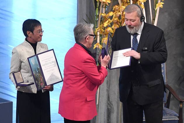 Philippine journalist Maria Ressa and Russian journalist Dmitry Muratov receive their Nobel Peace Prize for their courageous fight for freedom of expression in the face of authoritarian governments during the Nobel Peace Prize Award Ceremony 2021 at the Oslo City Town Hall in Norway. Both have been subject to threats for their reporting on human rights abuses and corruption carried out by the governments of Philippine President Rodrigo Duterte and Russian President Vladimir Putin respectively. DECEMBER 10th 2021  RHDx21651