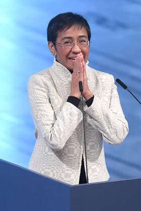Philippine journalist Maria Ressa and Russian journalist Dmitry Muratov receive their Nobel Peace Prize for their courageous fight for freedom of expression in the face of authoritarian governments during the Nobel Peace Prize Award Ceremony 2021 at the Oslo City Town Hall in Norway. Both have been subject to threats for their reporting on human rights abuses and corruption carried out by the governments of Philippine President Rodrigo Duterte and Russian President Vladimir Putin respectively. DECEMBER 10th 2021  RHDx21651