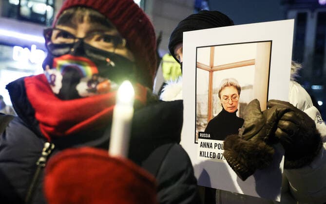 OSLO, NORWAY â€“ DECEMBER 10, 2021: People carry portraits of killed journalists during a torchlight parade in honour of the 2021 Nobel Peace Prize winners from Oslo Central Station to the Grand Hotel where the laureates greet the procession participants from the balcony. The Norwegian Nobel Committee has decided to award the Nobel Peace Prize for 2021 to Filipino-American journalist, co-founder and CEO of Rappler Maria Ressa and Russian journalist, Novaya Gazeta editor-in-chief Dmitry Muratov in recognition of their efforts to safeguard freedom of expression, which is a precondition for democracy and lasting peace . Sergei Bobylev TASS  TS11B66D