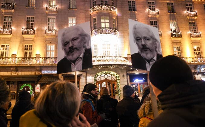OSLO, NORWAY â€“ DECEMBER 10, 2021: People take part in a torchlight parade in honour of the 2021 Nobel Peace Prize winners from Oslo Central Station to the Grand Hotel where the laureates greet the procession participants from the balcony. The Norwegian Nobel Committee has decided to award the Nobel Peace Prize for 2021 to Filipino-American journalist, co-founder and CEO of Rappler Maria Ressa and Russian journalist, Novaya Gazeta editor-in-chief Dmitry Muratov in recognition of their efforts to safeguard freedom of expression, which is a precondition for democracy and lasting peace . Sergei Bobylev TASS  TS11B670