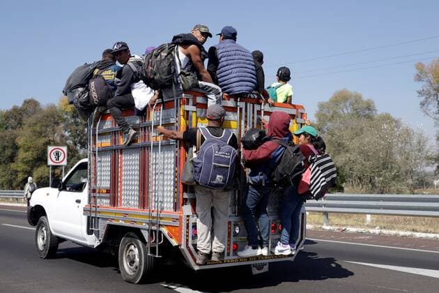 A group of migrants board a truck in the municipality of San Martín Texmelucan, on the Puebla-Mexico highway in Mexico, 10 December 2021. The migrant caravan plans to arrive in Mexico City this Friday night or Saturday morning after a last stop in the state of Puebla, where they are moving by road despite the impact of the accident in the south that killed more than 50 migrants. EFE Hilda Ríos Migrant caravan will arrive in Mexico City after last stop in Puebla !ACHTUNG: NUR REDAKTIONELLE NUTZUNG!  Copyright: xHildaxRíosx MEX140 20211210-618b8cb4414660a312142998b47bb389f93c5f37