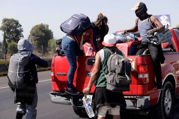 A group of migrants get on a truck at the municipality of San Martín Texmelucan, on the Puebla-Mexico highway in Mexico, 10 December 2021. The migrant caravan plans to arrive in Mexico City this Friday night or Saturday morning after a last stop in the state of Puebla, where they are moving by road despite the impact of the accident in the south that killed more than 50 migrants. EFE Hilda Ríos Migrant caravan will arrive in Mexico City after last stop in Puebla !ACHTUNG: NUR REDAKTIONELLE NUTZUNG!  Copyright: xHildaxRíosx MEX142 20211210-316029ce49f7c02c7188018672aa5f7ef882e24f