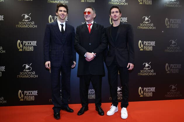 MOSCOW, RUSSIA - DECEMBER 10, 2021: Singers VladiMir, Grigory Leps, and YurKiss (Yuri Kiselev) (L-R) attend the 2021 Golden Gramophone Awards ceremony at the State Kremlin Palace. Valery Sharifulin TASS  TS11B6DB