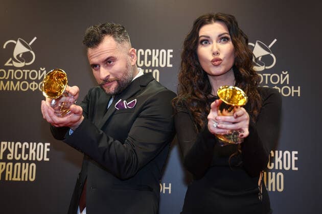 MOSCOW, RUSSIA - DECEMBER 10, 2021: Singers Irakli Pirtskhalava and Masha Veber attend the 2021 Golden Gramophone Awards ceremony at the State Kremlin Palace. Valery Sharifulin TASS  TS11B6E2