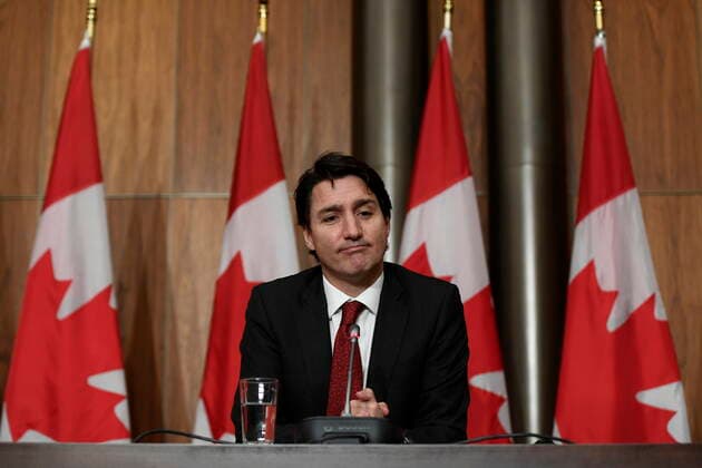 December 13, 2021, Ottawa, ON, CAN: Prime Minister Justin Trudeau listens to questions during an announcement on early learning and child care in New Brunswick, in Ottawa, on Monday, Dec. 13, 2021. Ottawa CAN  - ZUMAc35_ 20211213_zaf_c35_003 Copyright: xJustinxTangx