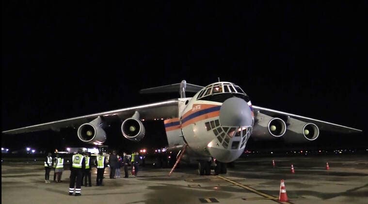 JOHANNESBURG, SOUTH AFRICA â€“ DECEMBER 14, 2021: A Russian Emergencies Ministry Ilyushin IL-76 transport aircraft is seen at an airport in Johannesburg. Russia has sent a team of virologists, epidemiologists, Rospotrebnadzor and Russian Health Ministry medical workers, Russian Emergencies Ministry officers and a Kamaz lorry equipped with a mobile laboratory of the Rospotrebnadzor Agency to South Africa amid the COVID-19 pandemic. The mission has been ordered by Russiaâ€™s President Putin in response to a request from South African President Ramaphosa. On 25 November 2021, the South African Ministry of Health reported the emergence of the Omicron variant of SARS-CoV-2 which causes COVID-19. Russian Emergencies Ministry TASS THIS IMAGE WAS PROV  TS11BC1E