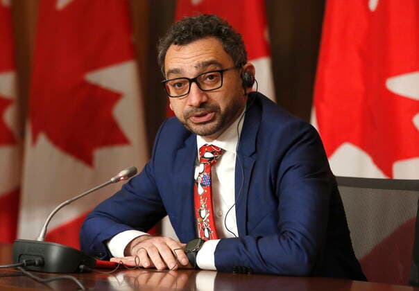 December 15, 2021, Ottawa, ON, Canada: Minister of Transport Omar Alghabra announces a government advisory against non-essential international travel due to the Omicron COVID-19 variant at a press conference in Ottawa on Wednesday, December 15, 2021. Ottawa Canada  - ZUMAc35_ 20211215_zaf_c35_026 Copyright: xPatrickxDoylex