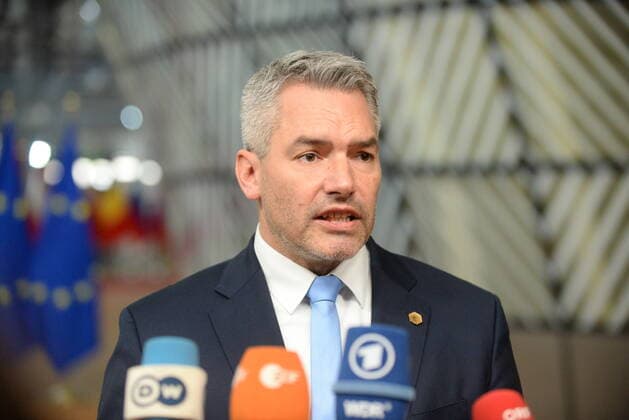 Austrian Chancellor Karl Nehammer speaks to journalists during arrival at the European Union summit, on December 16, 2021, in Brussels, Belgium. (CTKxPhoto PetrxKupec) CTKPhotoP2021121603380 