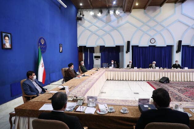 December 25, 2021, Tehran, Tehran, Iran: A handout picture provided by the Iranian presidency on December 25, 2021, shows Iran s President EBRAHIM RAISI chairing a meeting of the national staff against the coronavirus in the capital Tehran. Tehran Iran - ZUMAi98_ 20211225_zih_i98_019 Copyright: xIranianxPresidencyx