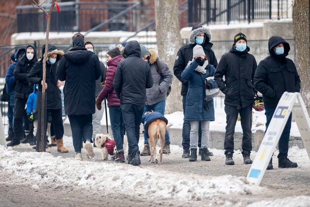 December 29, 2021, Montreal, PQ, Canada: People wait in line at a COVID-19 testing and vaccination site in Montreal, Wednesday, December 29, 2021, as the COVID-19 pandemic continues in Canada. Montreal Canada  - ZUMAc35_ 20211229_zaf_c35_001 Copyright: xGrahamxHughesx