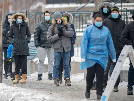 December 29, 2021, Montreal, PQ, Canada: People wait in line at a COVID-19 testing and vaccination site in Montreal, Wednesday, December 29, 2021, as the COVID-19 pandemic continues in Canada. Montreal Canada  - ZUMAc35_ 20211229_zaf_c35_004 Copyright: xGrahamxHughesx