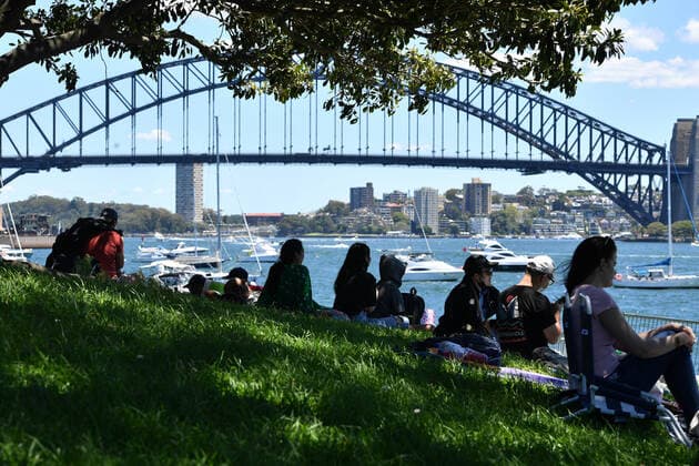 SYDNEY NEW YEARS EVE COLOUR, Small crowd numbers are seen gathered at Mrs Macquarie?s Chair ahead of New Year?s Eve celebrations in Sydney, Friday, December 31, 2021. Fireworks at 9pm and midnight will be displayed against the backdrop of the Sydney Opera House and Sydney Harbour Bridge with crowd numbers expected to be low due to increasing COVID 19 case numbers with more than 21,000 infections recorded in the past 24 hours. ( NO ARCHIVING, EDITORIAL USE ONLY, NO USE IN BOOKS WITHOUT CONSENT SYDNEY NSW AUSTRALIA  Copyright: xDEANxLEWINSx 20211231001609928694