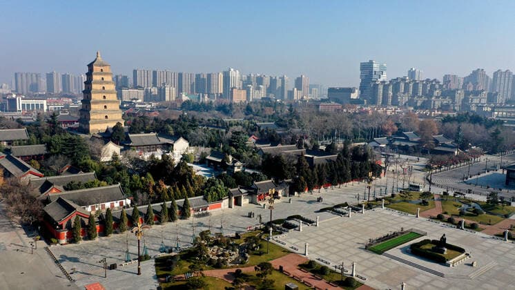 (220101) -- XI AN, Jan. 1, 2022 -- Aerial photo taken on Jan. 1, 2022 shows the city view of Xi an, northwest China s Shaanxi Province. Xi an, a northwestern Chinese city hit by a recent COVID-19 resurgence, has been making all-out efforts to ensure sufficient food and medicine supplies for its 13 million people who have been under lockdown for over a week. ) CHINA-SHAANXI-XI AN-COVID-19-RESURGENCE (CN) TaoxMing 