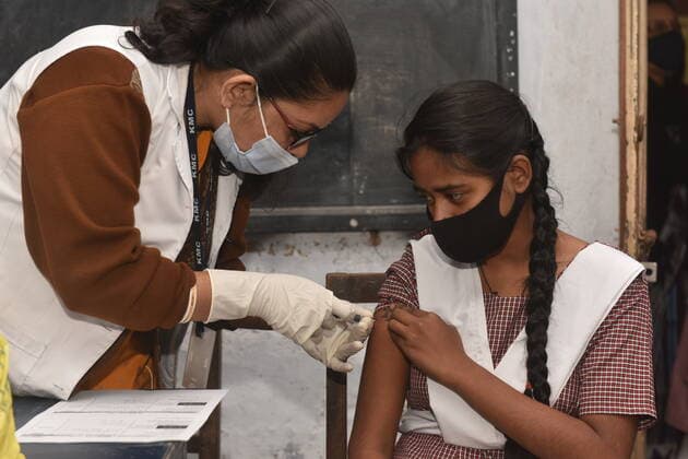 Age 15 to 18 years Covid Vaccination Drive in India India started vaccination for 15 to 18 year old from 3rd of January 2022. These age group children received indigenously-developed Bharat Biotech’s Covaxin as guidelines issued by the Union Health Ministry of India. Today the children s inoculation drive is rolled out, the Kolkata Municipal Corporation health department team of vaccinators reached government and private schools allocated which are located across 16 KMC boroughs. Kolkata West Bengal India Copyright: SukhomoyxSen