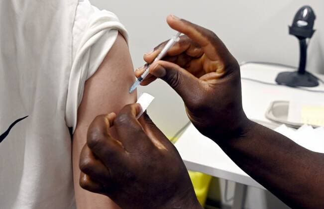 Man receiving his third covid-19 booster jab at the vaccine center in Espoo, Finland, on January 4, 2022. Espoo Finland  Copyright: xJussixNukarix LKLAPJ20220104152108O458