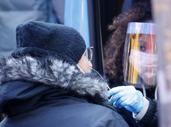 Patients are tested for COVID-19 at a mobil testing site parked Times Square in New York City on Tuesday, January 4, 2022. The United States continues to set records for positive COVID cases.  NYP20220104103 JohnxAngelillo