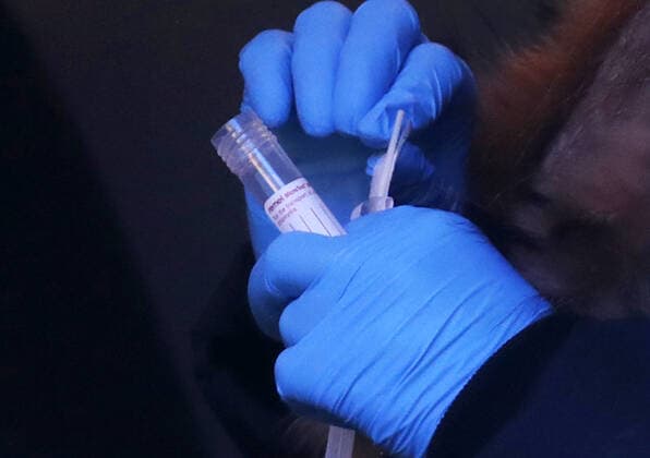 Patients are tested for COVID-19 at a mobil testing site parked Times Square in New York City on Tuesday, January 4, 2022. The United States continues to set records for positive COVID cases.  NYP20220104104 JohnxAngelillo