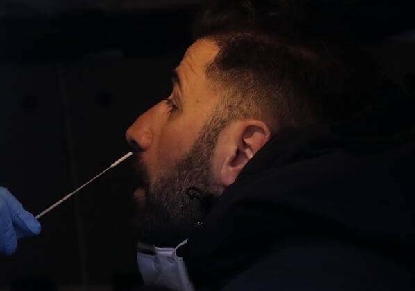 Patients are tested for COVID-19 at a mobil testing site parked Times Square in New York City on Tuesday, January 4, 2022. The United States continues to set records for positive COVID cases.  NYP20220104115 JohnxAngelillo