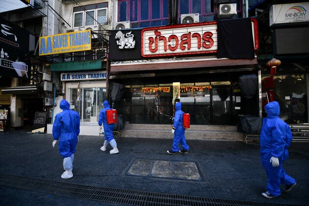 Thailand: Clean-up after revelers tested positive for COVID-19 coronavirus at a tourist spot A Thai volunteer staff in a protective suit sprays disinfectant at a nightclub and restaurant during a clean-up operation after revelers tested positive for COVID-19 coronavirus at a tourist spot in Khao San road, during COVID-19 coronavirus infections linked with the Omicron variant have been detected putting Thailand at risk of a new wave hit by the pandemic. Thailand Copyright: VichanxPoti