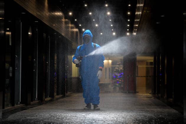 Thailand: Clean-up after revelers tested positive for COVID-19 coronavirus at a tourist spot A Thai volunteer staff in a protective suit sprays disinfectant at a nightclub and restaurant during a clean-up operation after revelers tested positive for COVID-19 coronavirus at a tourist spot in Khao San road, during COVID-19 coronavirus infections linked with the Omicron variant have been detected putting Thailand at risk of a new wave hit by the pandemic. Thailand Copyright: VichanxPoti