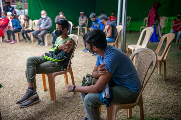 January 6, 2022, New Delhi, India: Teenagers seen seated in the waiting area after getting vaccination shots at Janakpuri vaccination camp..Amid Omicron surge the national capital has set up about 159 vaccination centers in the initial phase of the drive, now over 10 million youngsters have been vaccinated. New Delhi India - ZUMAs197 20220106_zaa_s197_146 Copyright: xPradeepxGaurx